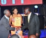 Lukiah Mulumba, a captain in the US Air Force, and her father greet the Vice President after she received her award at the Diaspora Dinner held at the Serena Victoria Ballroom on Thursday. PHOTO BY KALUNGI KABUYE