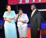 :ady Justice Julia Sebutinde after accepting her award at the Diaspora Dinner held at the Serena Victoria Ballroom on Thursday. Left is Dr Maggie Kigozi, patron of the Ugandan Diaspora Association, right is the Vice President Edward Ssekandi PHOTO BY KALUNGI KABUYE