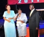 :ady Justice Julia Sebutinde after accepting her award at the Diaspora Dinner held at the Serena Victoria Ballroom on Thursday. Left is Dr Maggie Kigozi, patron of the Ugandan Diaspora Association, right is the Vice President Edward Ssekandi PHOTO BY KALUNGI KABUYE