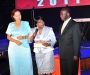 :ady Justice Julia Sebutinde after accepting her award at the Diaspora Dinner held at the Serena Victoria Ballroom on Thursday. Left is Dr Maggie Kigozi, patron of the Ugandan Diaspora Association, right is the Vice President Edward Ssekandi PHOTO BY KALUNGI KABUYE